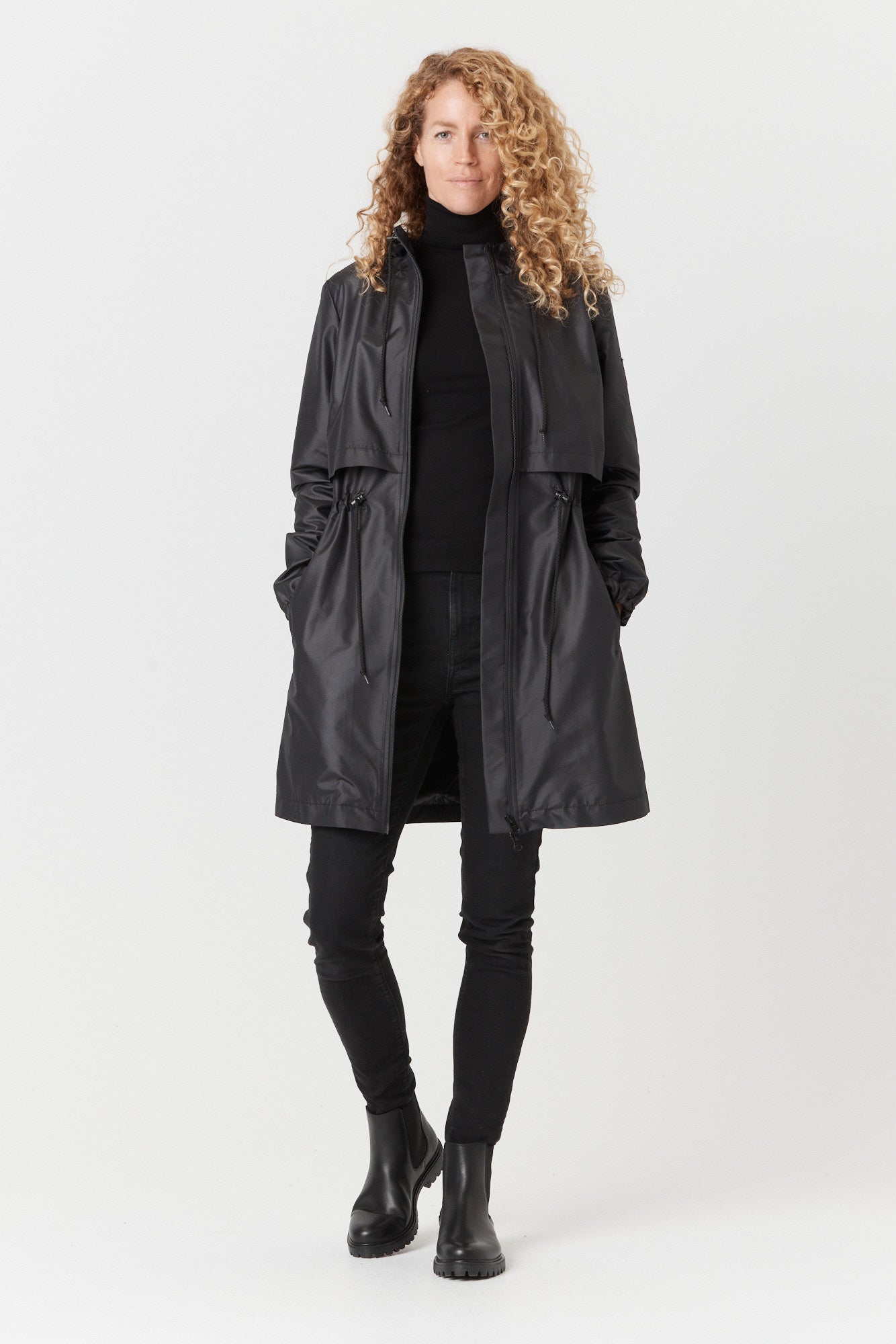 Desloups manteau mi-saison imperméable urbain avec capuchon, ajusté pour femme.