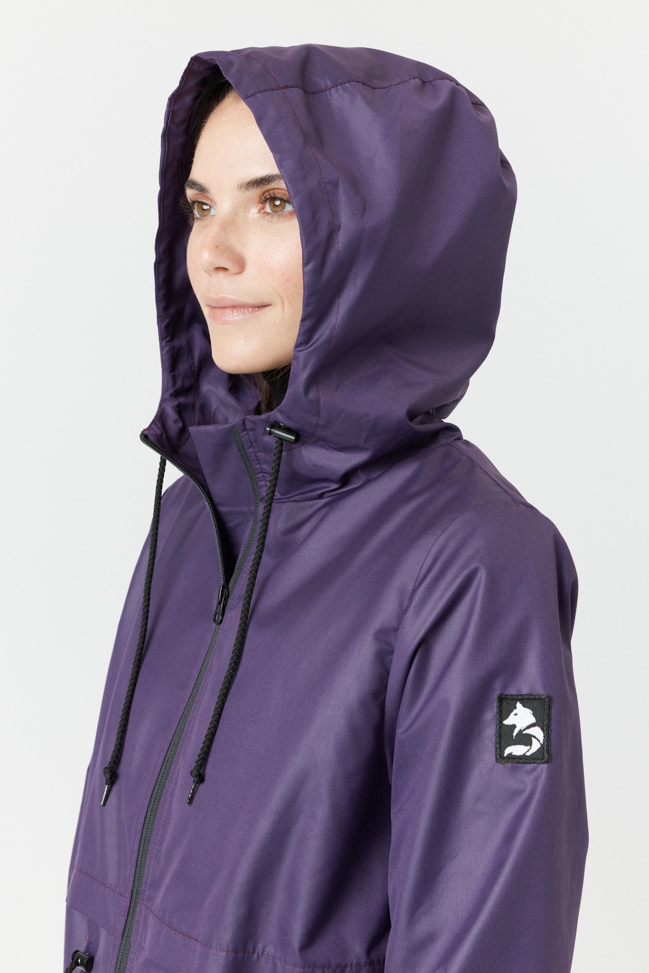 Desloups manteau mi-saison imperméable urbain avec capuchon, ajusté pour femme.